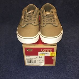 Men’s vans size 8.5 worn 3 times, look brand new.